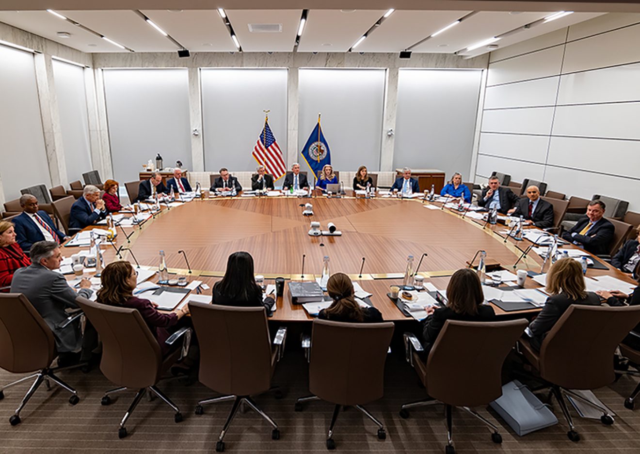 Policymakers at the Federal Reserve grapple with complex economic data, balancing inflation control with economic growth.