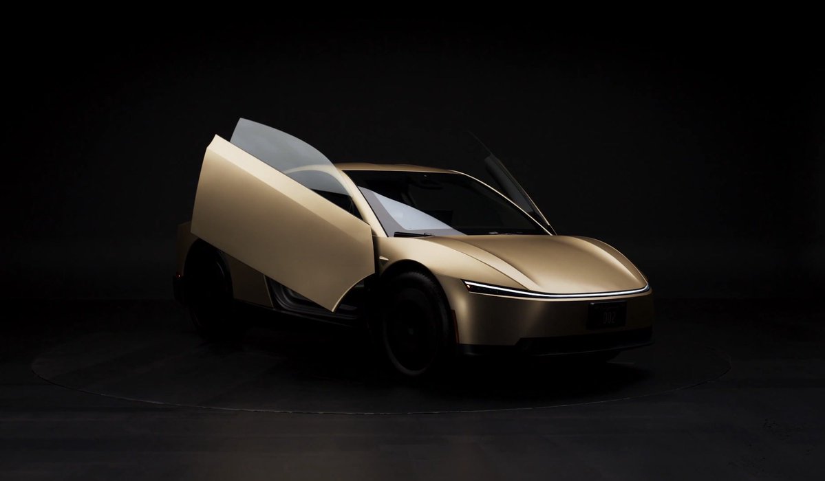 The two-seater Cybercab, showcased without traditional driver controls, represents Tesla's bold vision for autonomous mobility.