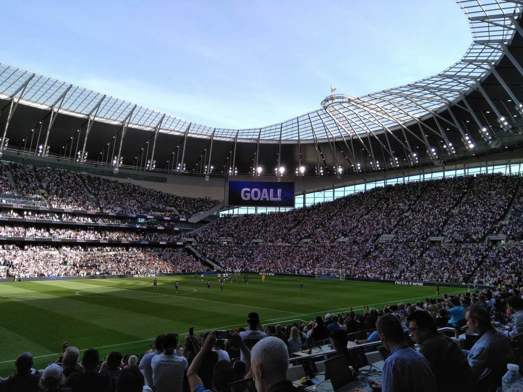 The Tottenham Hotspur Stadium on a match day, where the team secured their first Premier League win of the season.